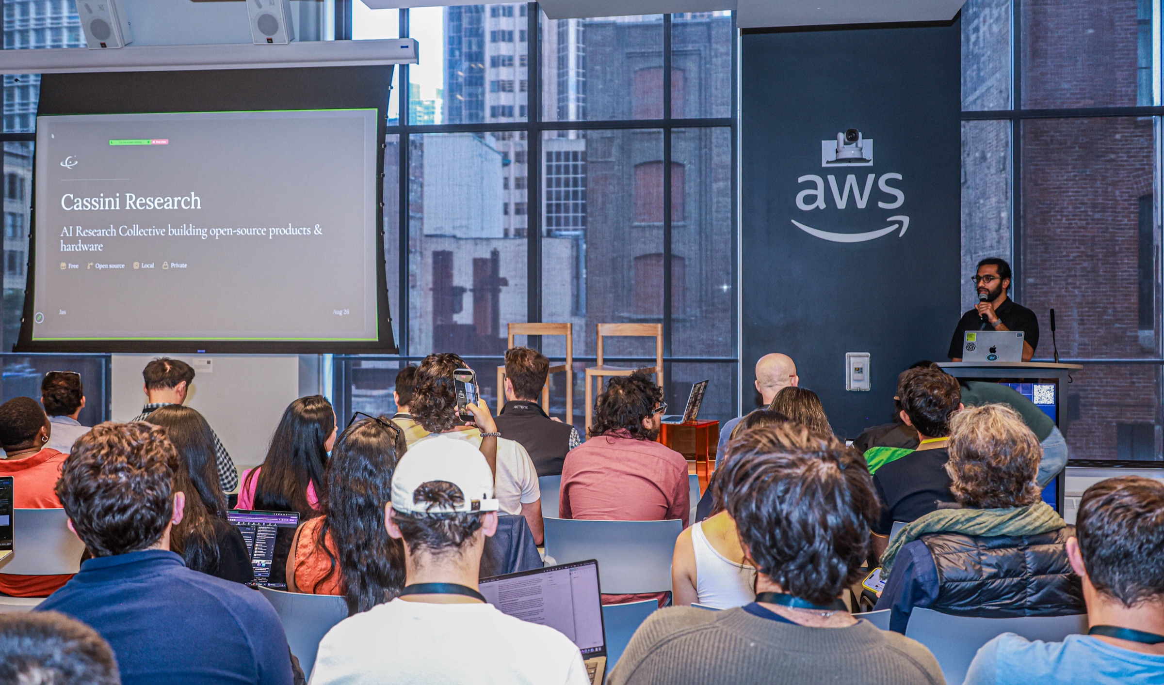 Cassini Research presenting to an audience at AI Startup Pitch Night in San Francisco.