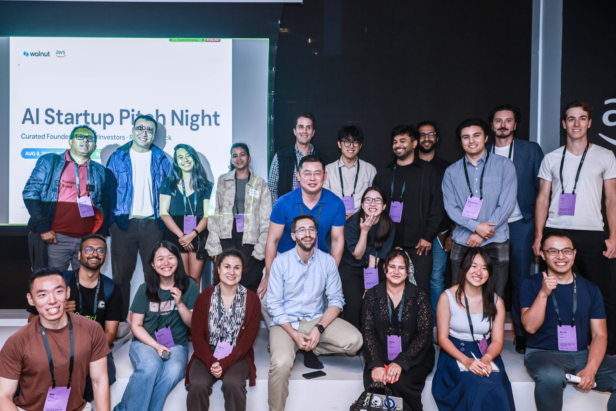 Founders, organizers, judges, and attendees gathered for a group photo at AI Startup Pitch Night.